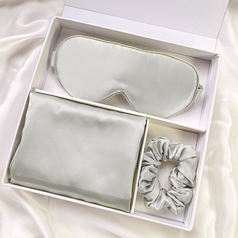 Detail close on the silk eye mask strap and pillowcase finish