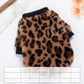 Close up of the plush leopard print fleece on the dog sweater