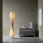 Angled hero shot of the twisted petal spiral wood slat lamp and slim stem
