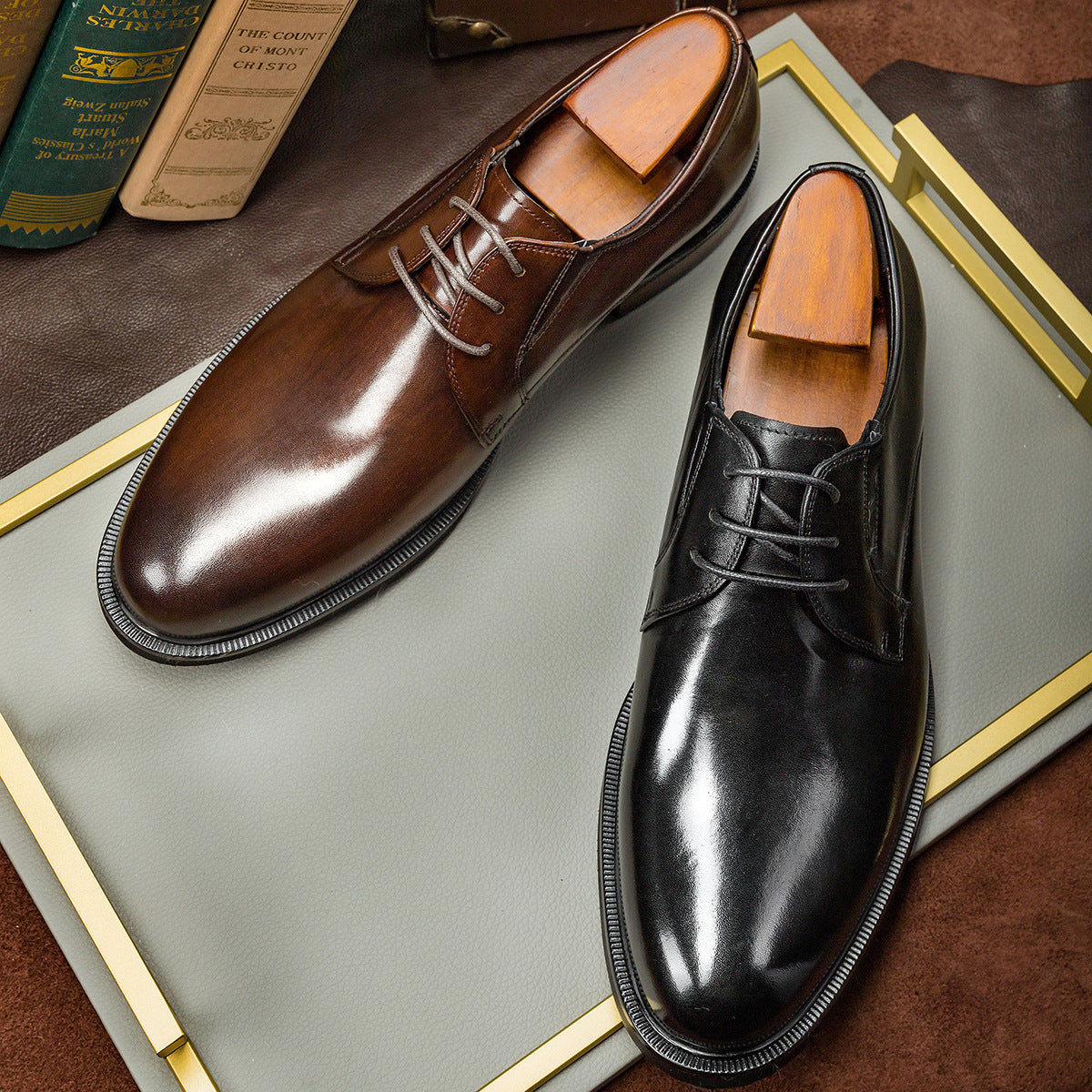 brown derby leather shoes pair front view