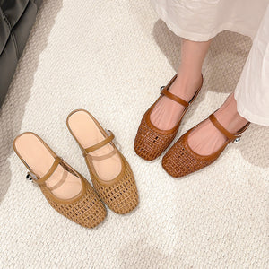 Camel and brown woven Mary Jane mules on a cream rug, one pair on the feet and one pair on the floor