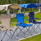 Three foldable camping chairs with canopies in beige, blue and navy lined up on a park path