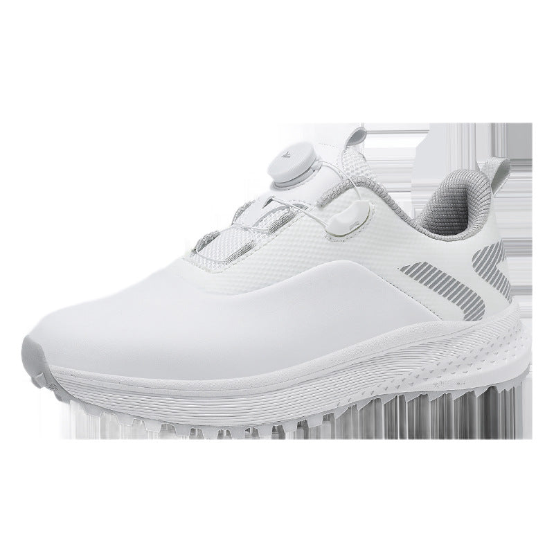 White low top golf shoe with a twist dial closure and a nubbed spikeless rubber outsole