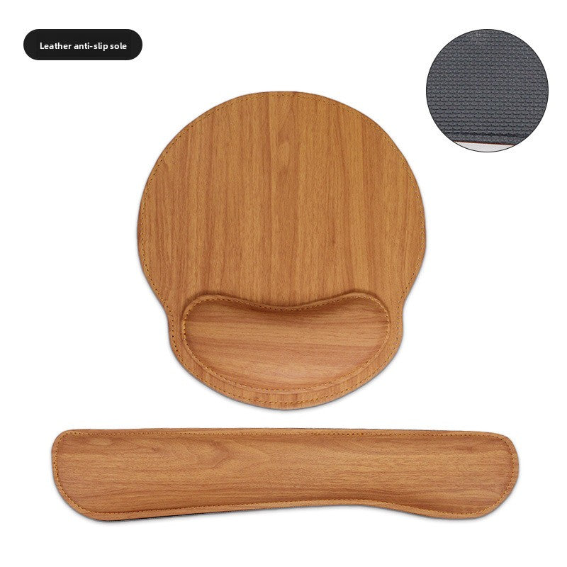 Round leather look mouse pad with memory foam wrist support in brown