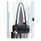 Black cylinder shoulder bag with two long straps and a baseball glove charm on white, option Black