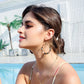 Boho vintage clip-on drop earrings with fringe and bead accents, zinc alloy build, studio image on white background