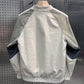 Thin baseball collar jacket worn open over a plain tee for a relaxed look