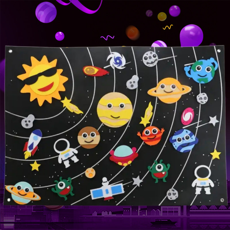 Space felt story board with smiling felt planets, rockets and astronauts on a dark starry background