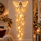 Illustrated Christmas wall display with a glowing angel with outspread wings above falling stars, Angel option