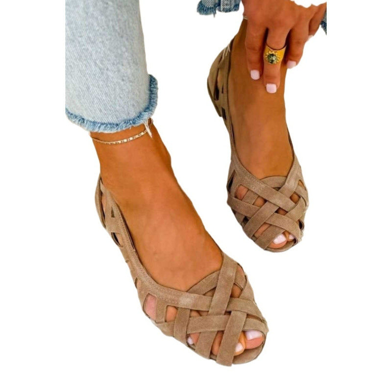 Thin flat sole of a woven suede cut out sandal, low profile
