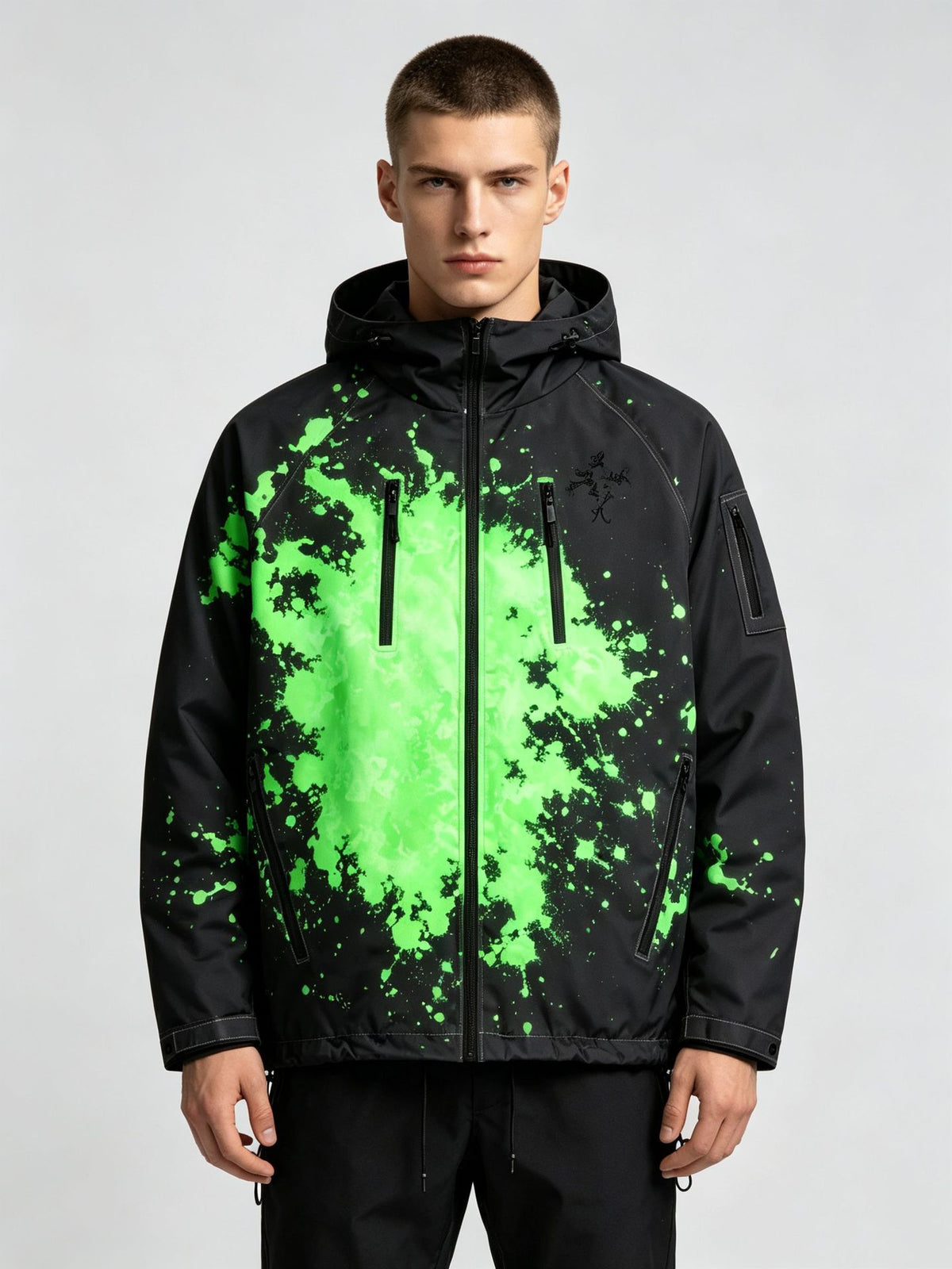 Man wearing the black hooded jacket with a fluorescent green splash ink print, option photo for size 3XL