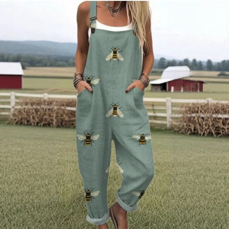 Relaxed printed jumpsuit with front pockets and tapered legs, sleeveless overall cut
