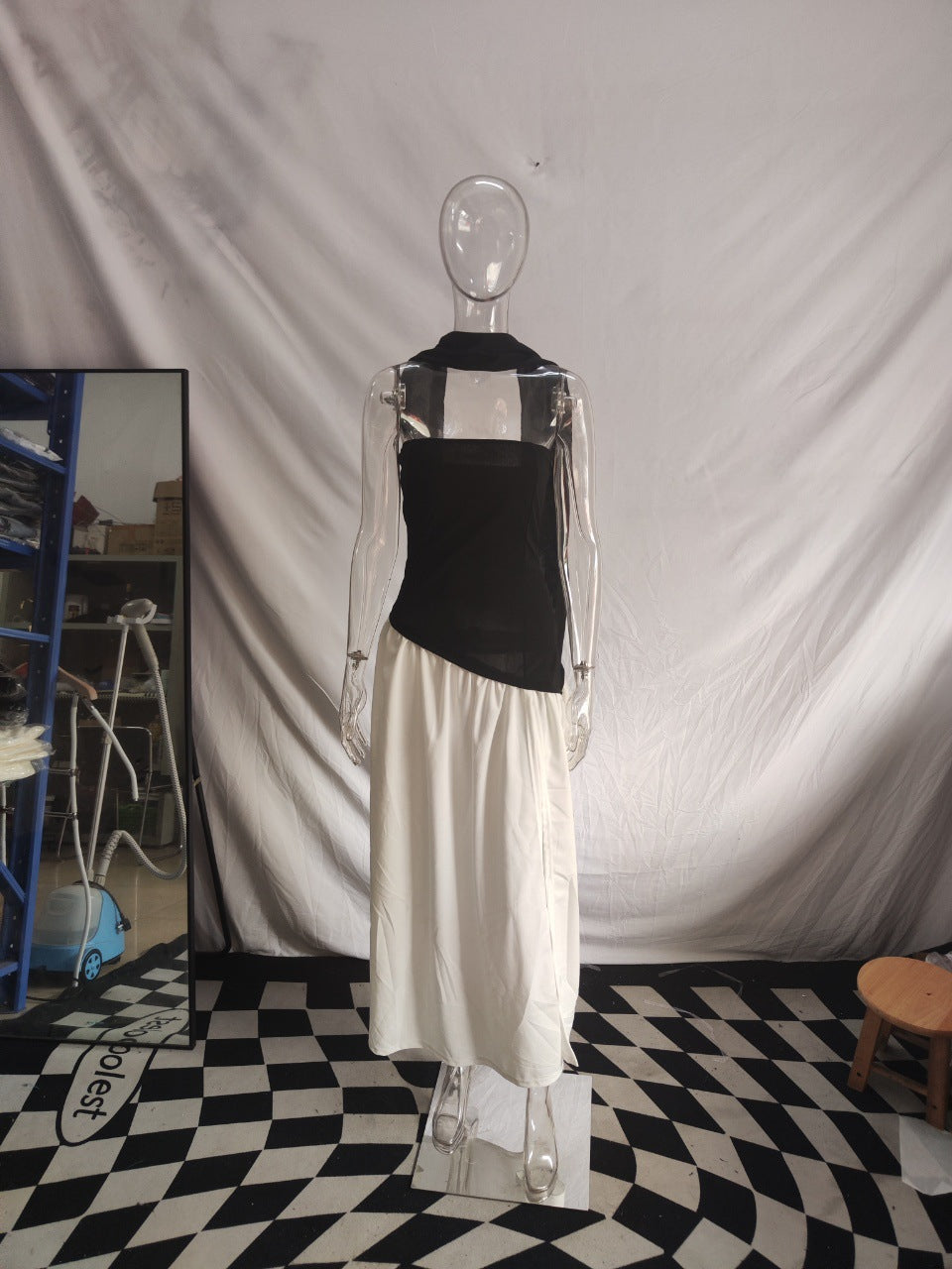 Fit on the model from a low angle showing the knee length cut