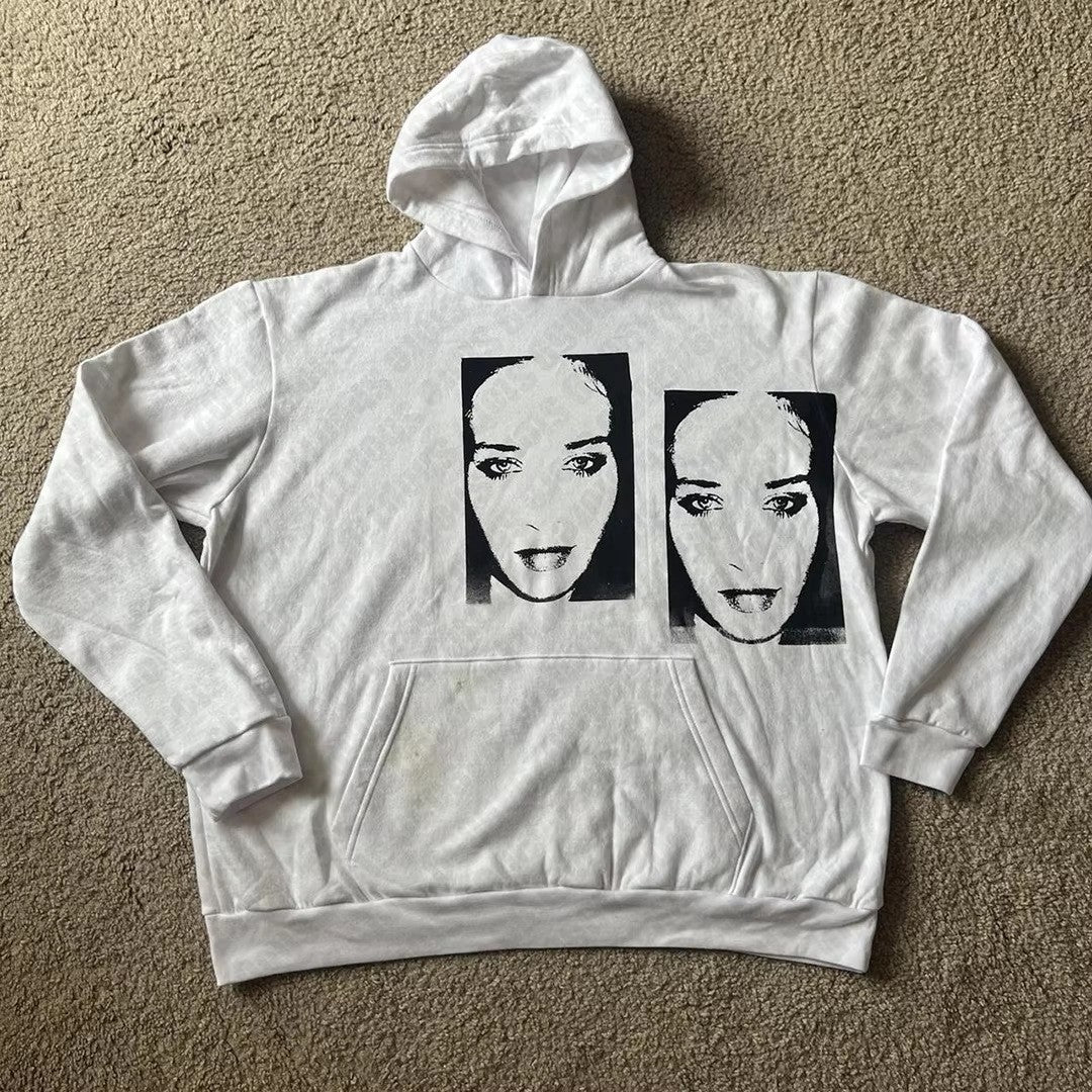 Black pullover hoodie with a hand painted Home Sick heart printed across the chest
