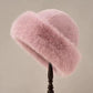 Winter Warm Imitation Fur Bucket Hat | scale reference next to a hand