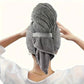 Light grey coral fleece hair drying towel wrapped on the head with an elastic strap, photo for the Light Gray option
