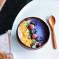 Coconut Shell Bowl with Wood Utensils | top down arrangement layout