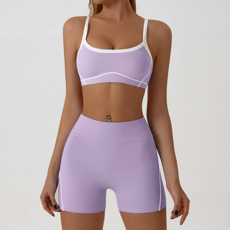 Matched sports bra and shorts set shown in a solid tone under soft studio light
