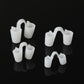 Four soft white solid silicone nose vents in graded sizes on a black background