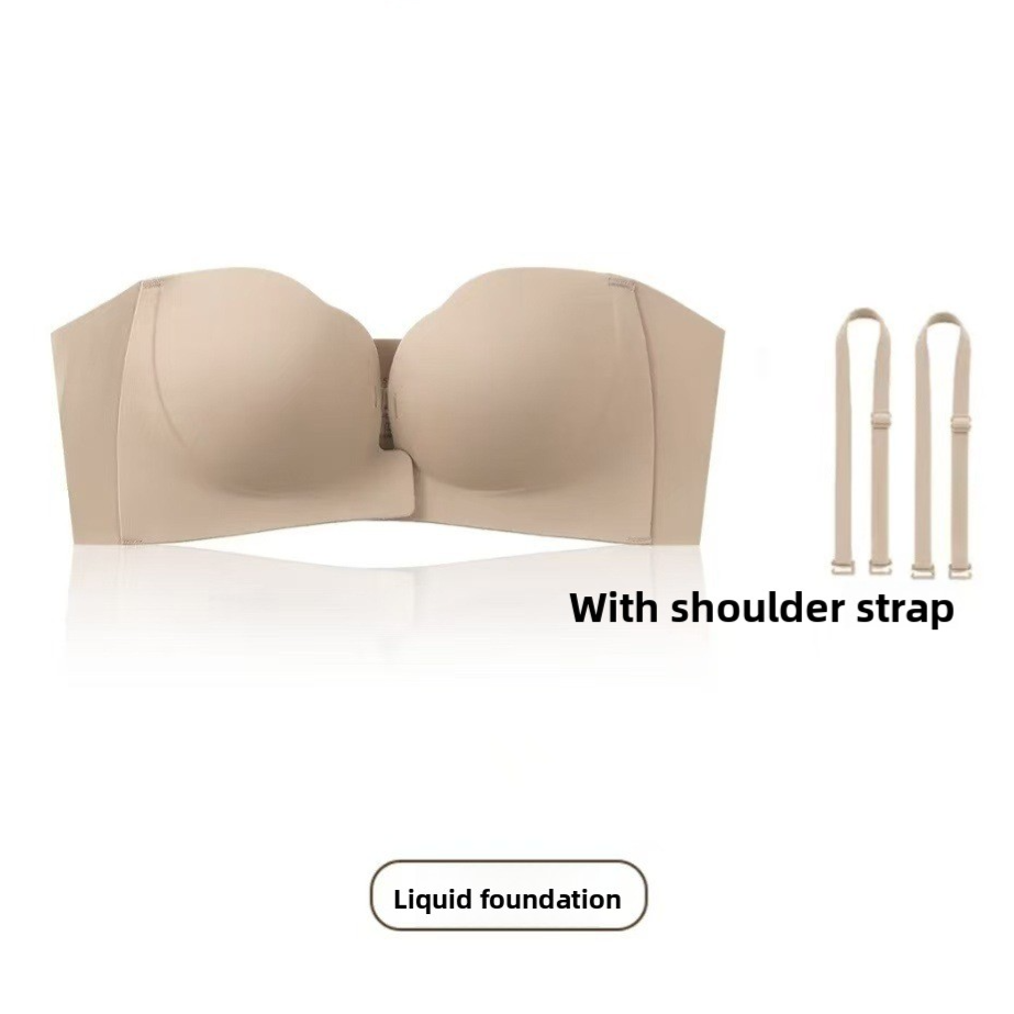 Woman wearing a beige strapless push-up bra showing the smooth invisible neckline