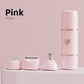 Soft pink mini shaver body on a pink podium beside its foil, blade and nose heads