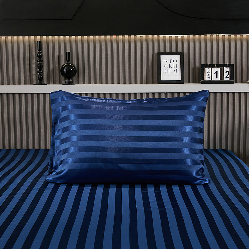 Satin pillowcase corner detail showing the smooth glossy surface