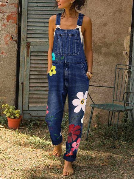 Dark blue denim print bib overalls with large flowers down one leg, option photo for size 4XL