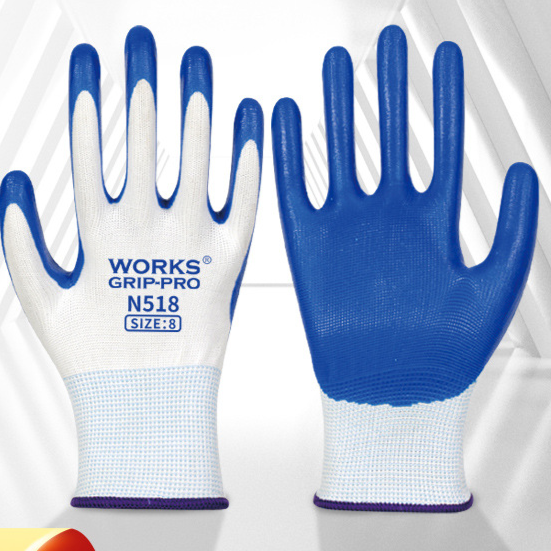 Pair of blue nitrile coated work gloves on a white knit liner printed WORKS GRIP-PRO N518, product photo for the blue option