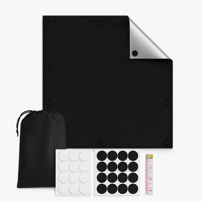 Portable blackout curtain pressed onto a bright window with suction cups