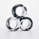 Set of magnetic fidget rings shown stacked together, front view