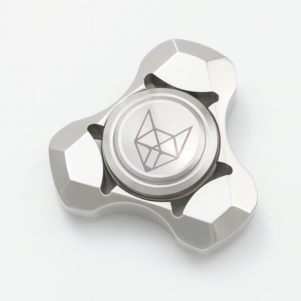 Triangular metal fox fidget spinner with pink and blue splatter finish, full view