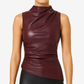 Close-up of the draped mock neckline on the sleeveless faux leather top