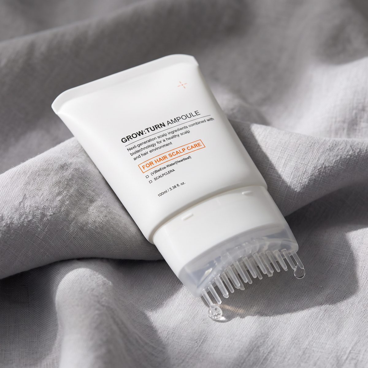 Scalp care hair essence comb head with an essence droplet
