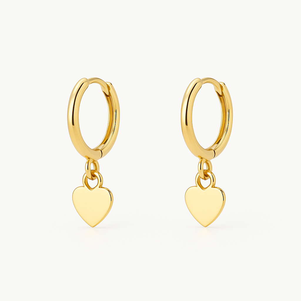 Heart shaped 18K gold ear cuff worn on the outer ear ridge