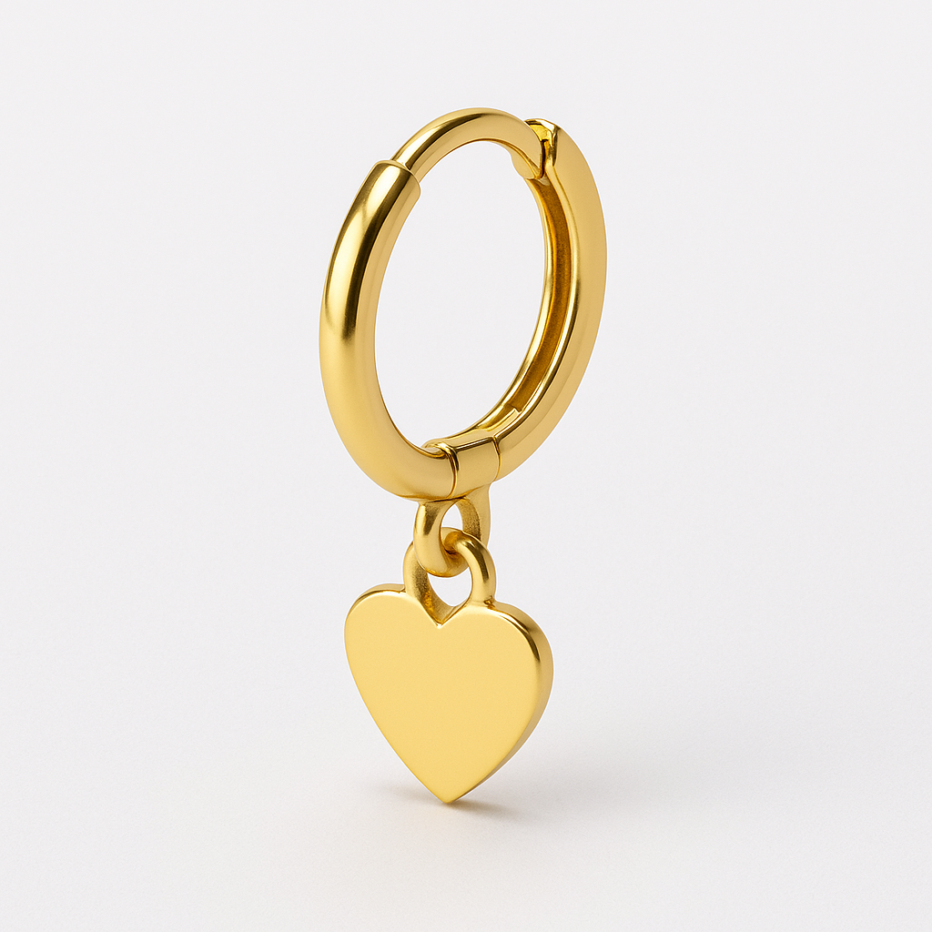 Side profile of the gold cuff with small open heart motif