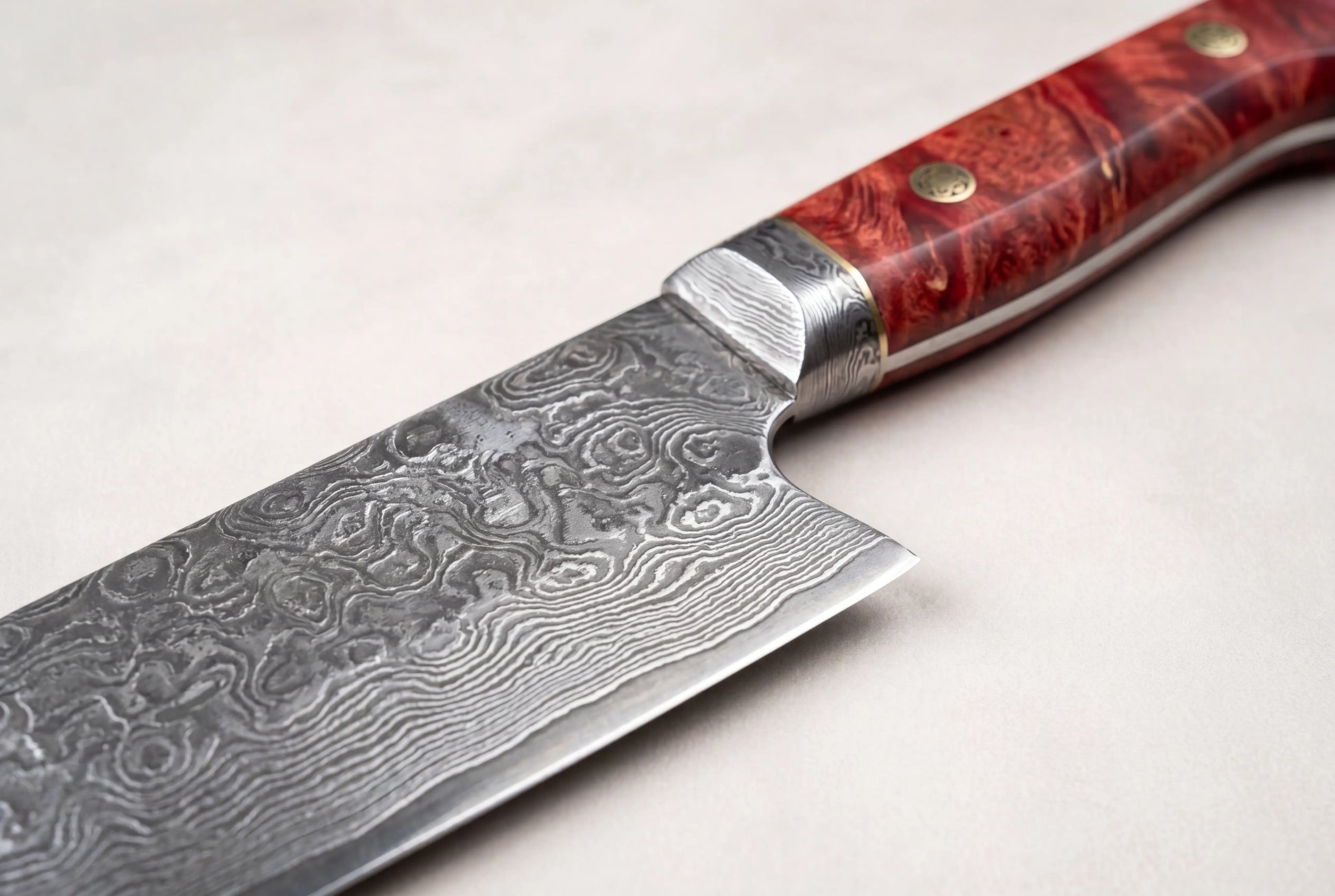 Macro close up of the layered Damascus steel blade