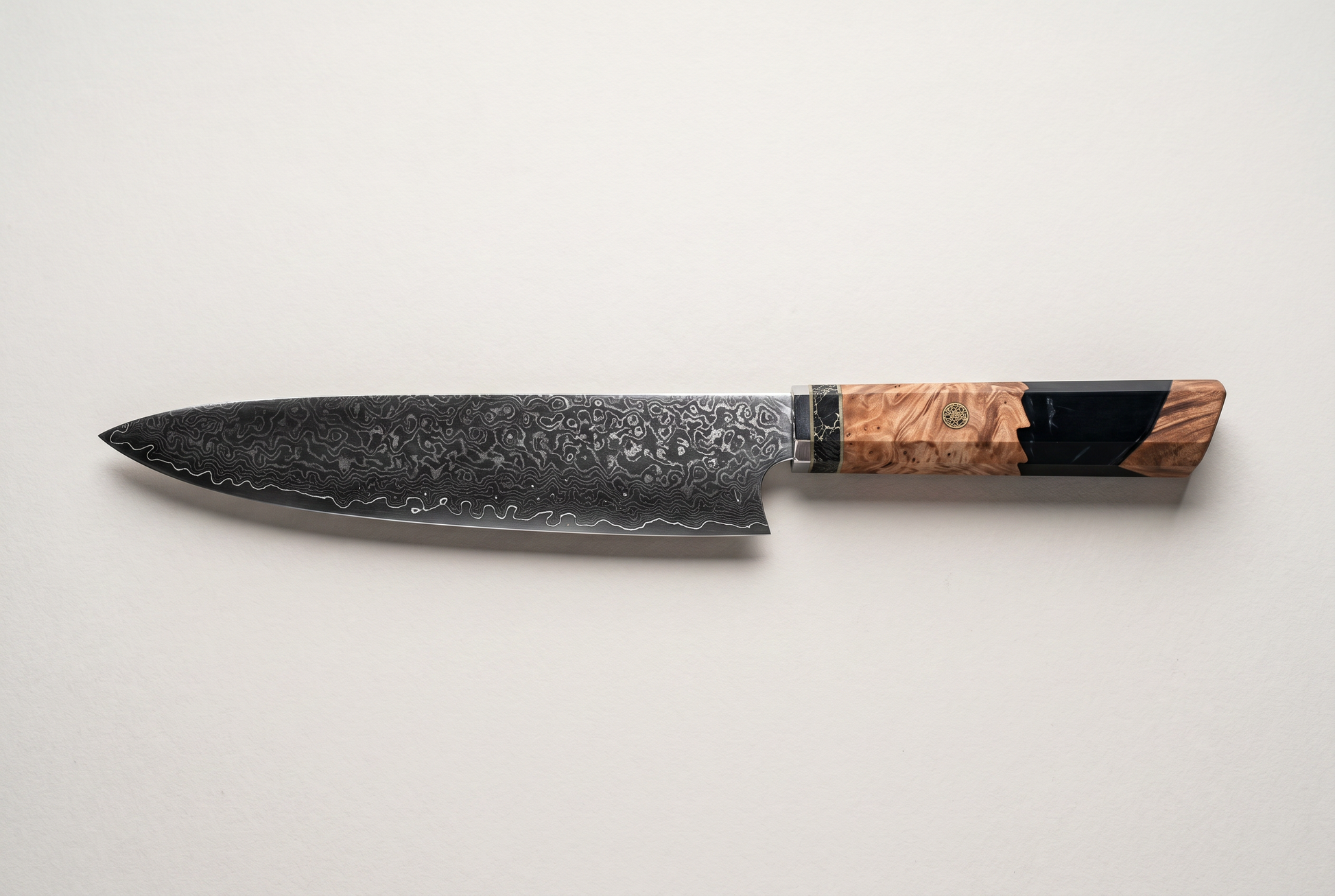 Forged Damascus chef knife with black resin wood handle