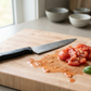 A dull kitchen knife leaves a tomato crushed and uneven