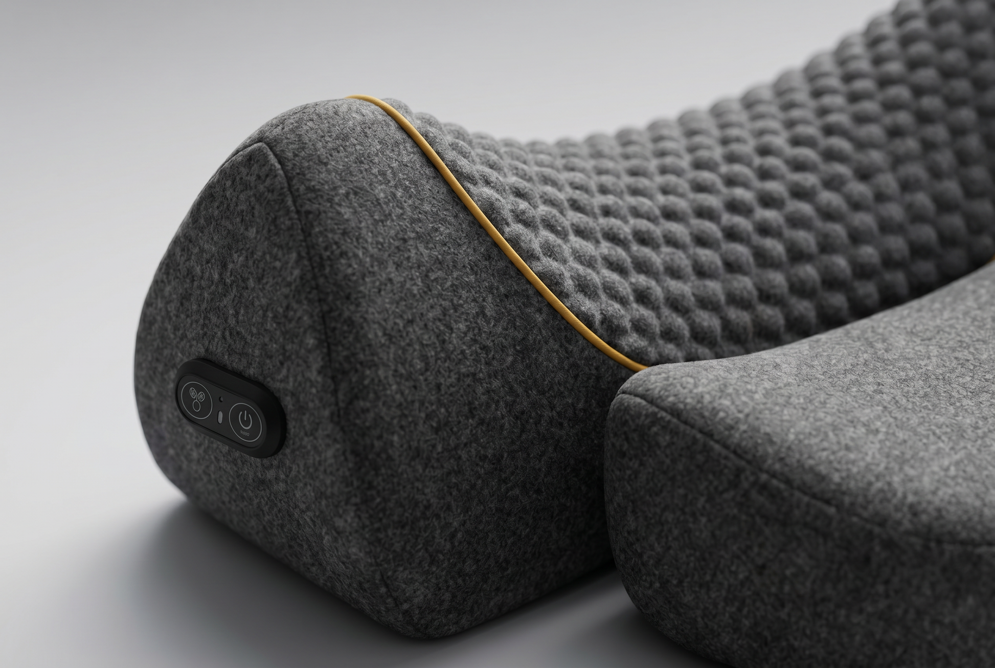 Close up of the dimpled memory foam texture and breathable polyester cover with yellow piping