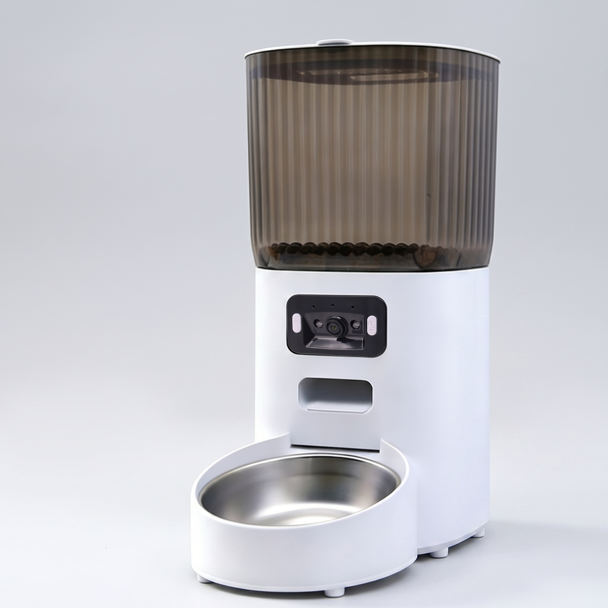 Smart pet feeder with built-in camera and transparent food hopper on a clean studio background