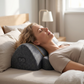 Woman sleeping peacefully with her neck supported by the ergonomic neck pillow
