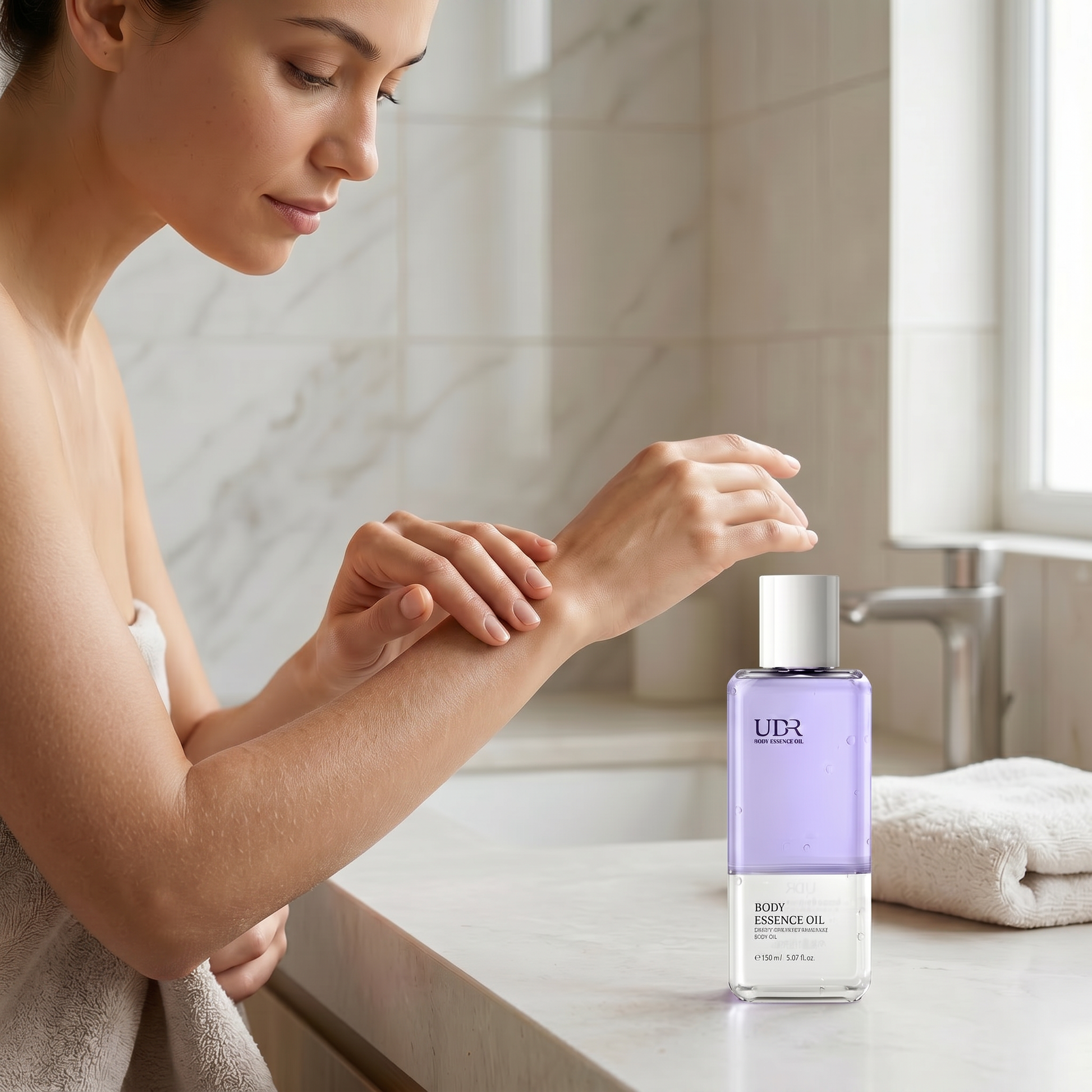 Woman looking at her dry skin before applying the UDR body essence oil in the same bathroom