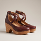 Women's burgundy red cross strap chunky wooden heel pump sandals shown as a pair