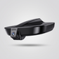 4K dash camera glossy black body with blue tinted lens on neutral studio background