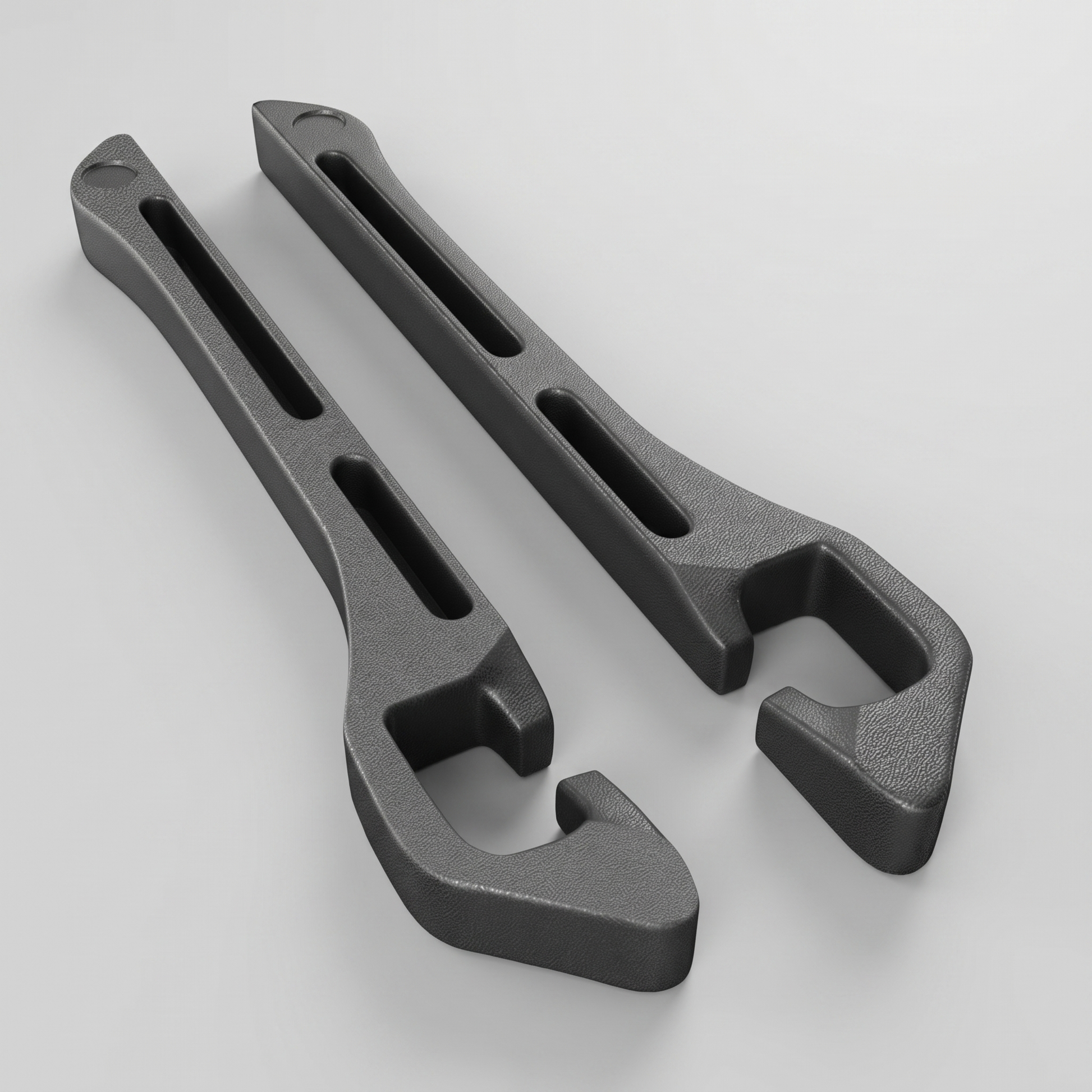 Pair of car seat gap filler strips in dark charcoal EVA foam