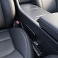 Open car seat gap with a phone and coins slipped down out of reach