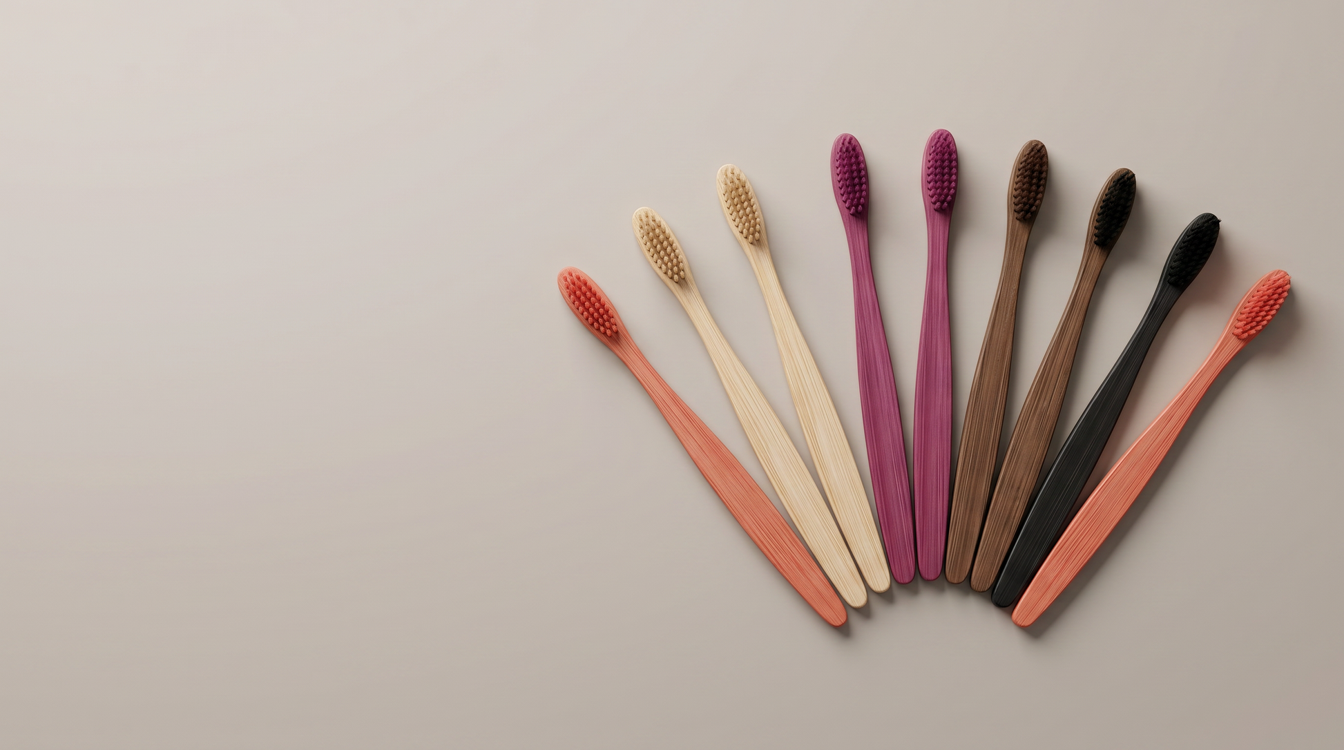 Soft bristled bamboo toothbrush set presented on a clean premium surface