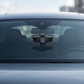 4K dash cam mounted behind the windshield seen from the front of the car, lens facing forward toward the road