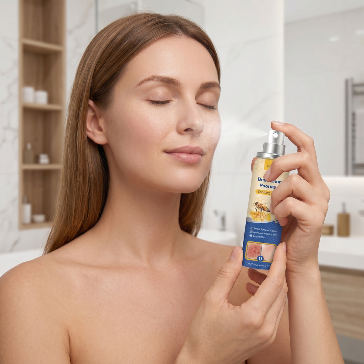 Misting the face with the fine facial spray