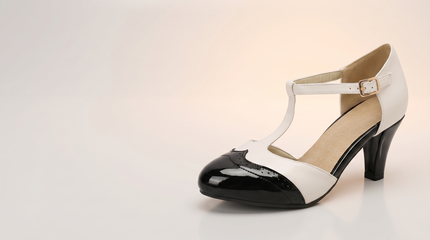 Introducing Patent T Strap Heels With A Retro Two Tone Finish: